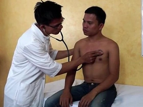 Young Thai doctor has his cock sucked by a twink in a hospital room.