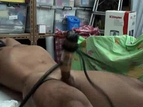 Gay Asian bondage scene with milking and Venus themes