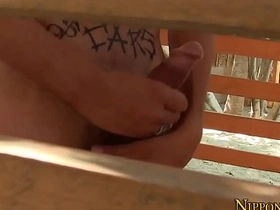 Solo masturbation scene with an Asian man with tattoos.