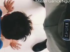 An Asian man satisfies his boss at the office and is very loyal to him.