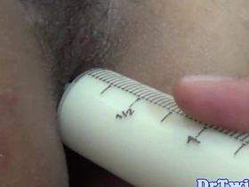 Young Asian boy enjoys enema in uniform
