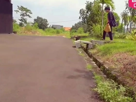 Public nudity in a downtown garden, solo performance by Hansel Thio.