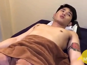 Beautiful Asian boy gives a great massage with his hands