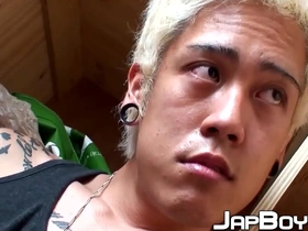 A blonde Japanese twink plays with his hole and strokes his big dick in this solo scene.
