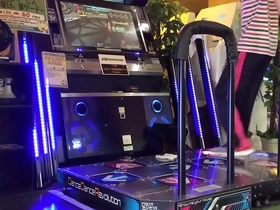 Gay Japanese man enjoys DDR with a hard cock