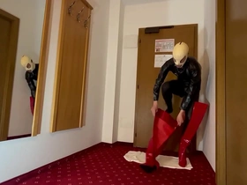 Dressed to kill: Rubberized man in fetish gear
