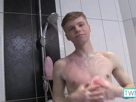 Horny twink James indulges in steamy shower session and solo play